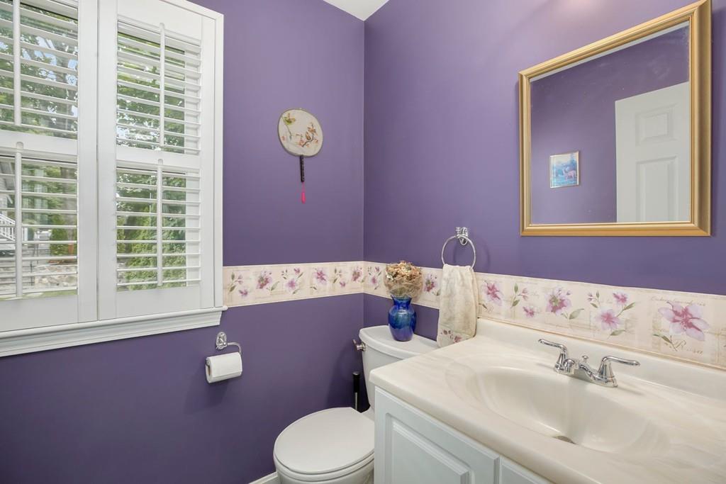 7 Cedar Brook Road Wellesley, MA 02482 - Photo 18 of 36 a bathroom with a sink a toilet and a window