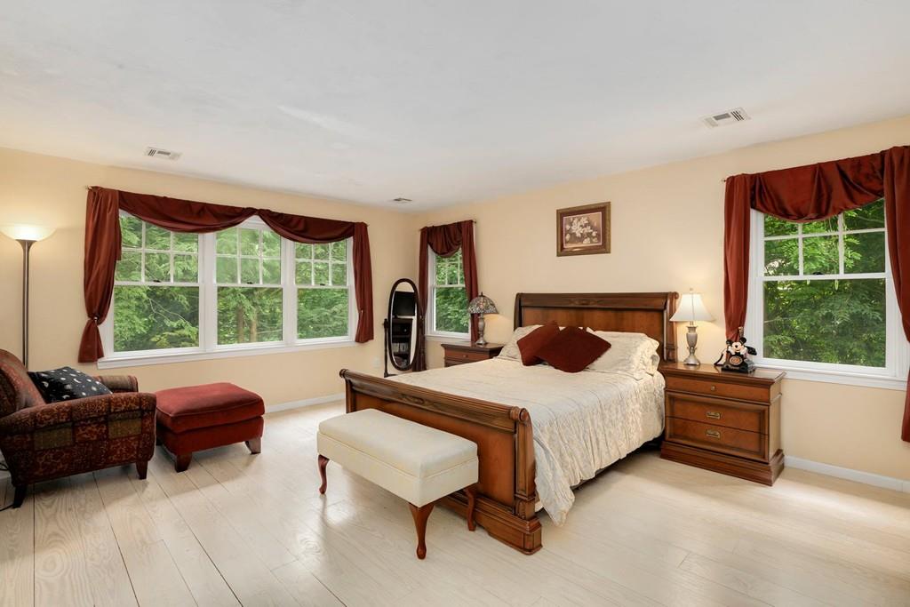 7 Cedar Brook Road Wellesley, MA 02482 - Photo 19 of 36 a bedroom with a bed and a large window