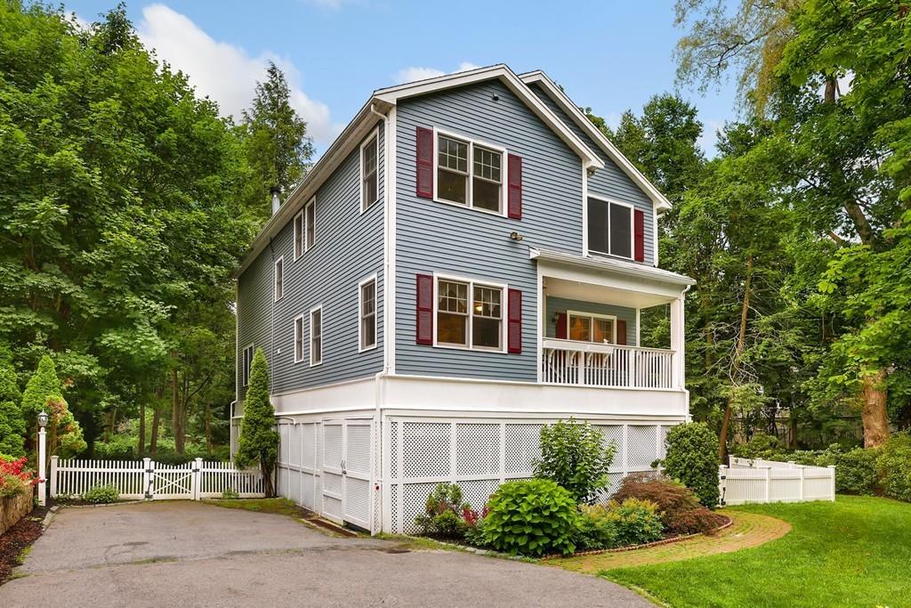 7 Cedar Brook Road Wellesley, MA 02482 - Photo 2 of 36 a front view of a house with a yard