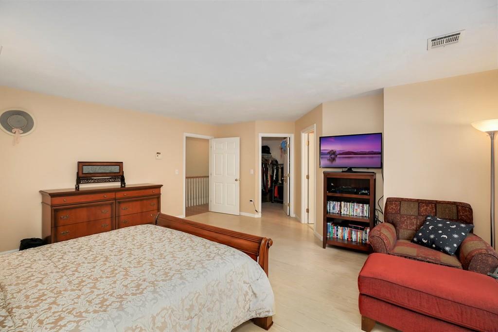 7 Cedar Brook Road Wellesley, MA 02482 - Photo 21 of 36 a bedroom with furniture and a bed