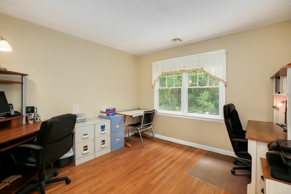 7 Cedar Brook Road Wellesley, MA 02482 - Photo 25 of 36 a view of a workspace with furniture and a window