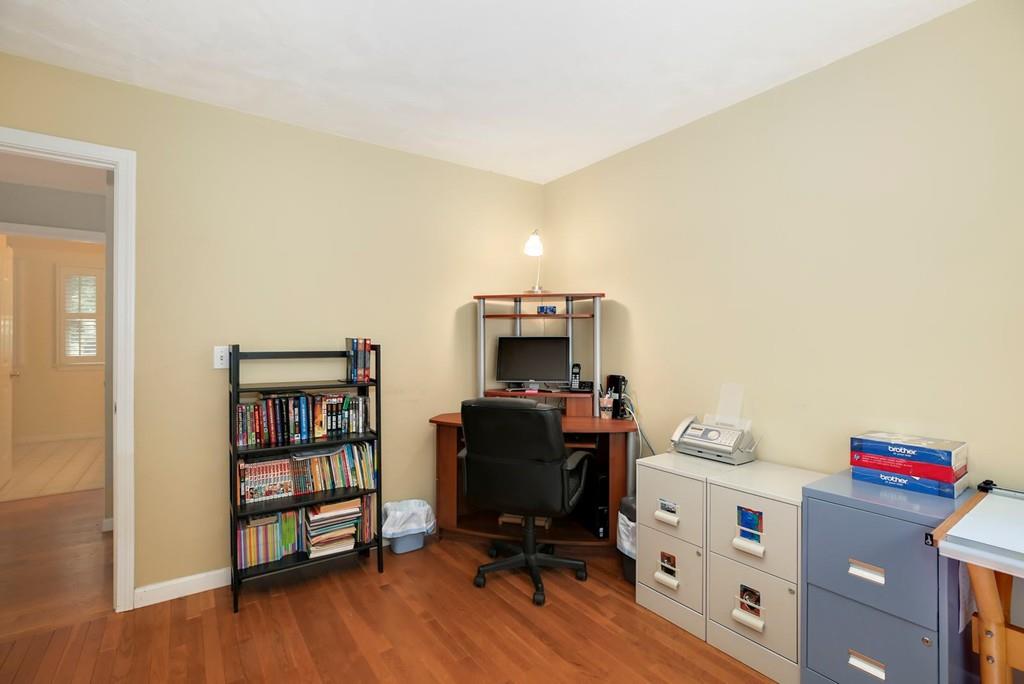 7 Cedar Brook Road Wellesley, MA 02482 - Photo 26 of 36 a view of a workspace with furniture and wooden floor