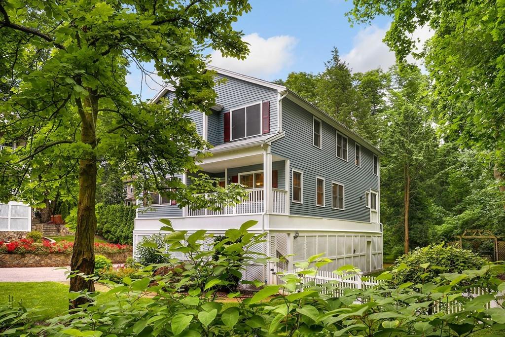 7 Cedar Brook Road Wellesley, MA 02482 - Photo 3 of 36 a front view of a house with garden