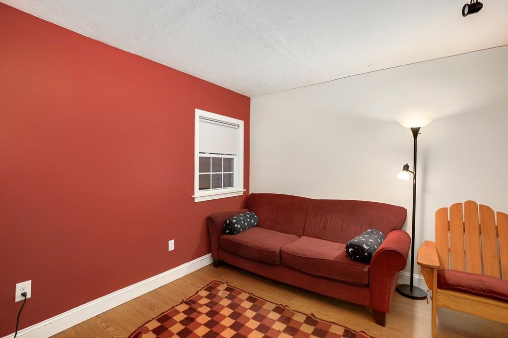 7 Cedar Brook Road Wellesley, MA 02482 - Photo 31 of 36 a living room with furniture and a window