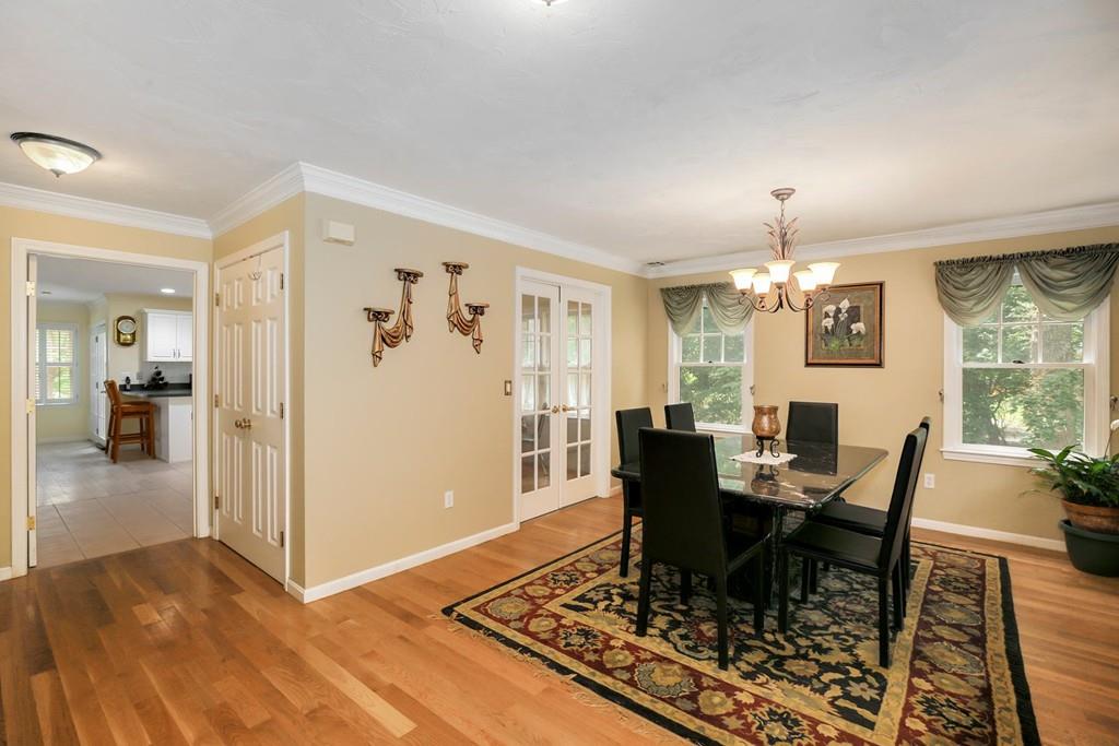 7 Cedar Brook Road Wellesley, MA 02482 - Photo 5 of 36 a view of a dining room with furniture window and wooden floor