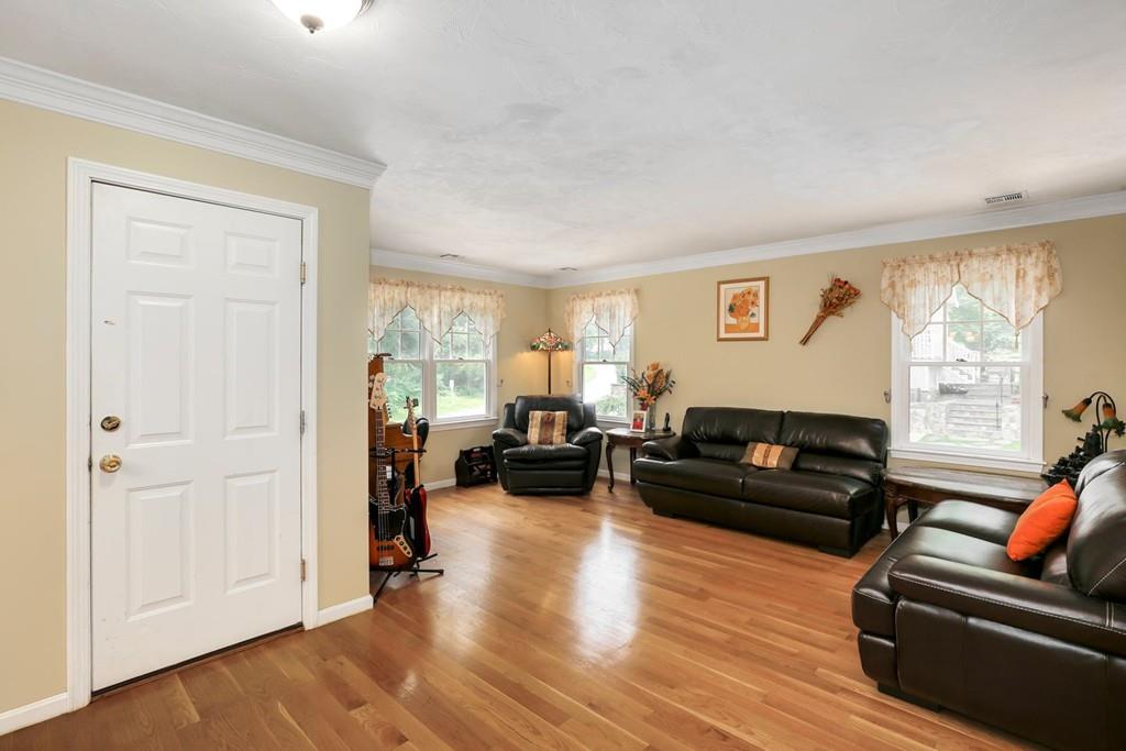 7 Cedar Brook Road Wellesley, MA 02482 - Photo 7 of 36 a living room with furniture window and wooden floor