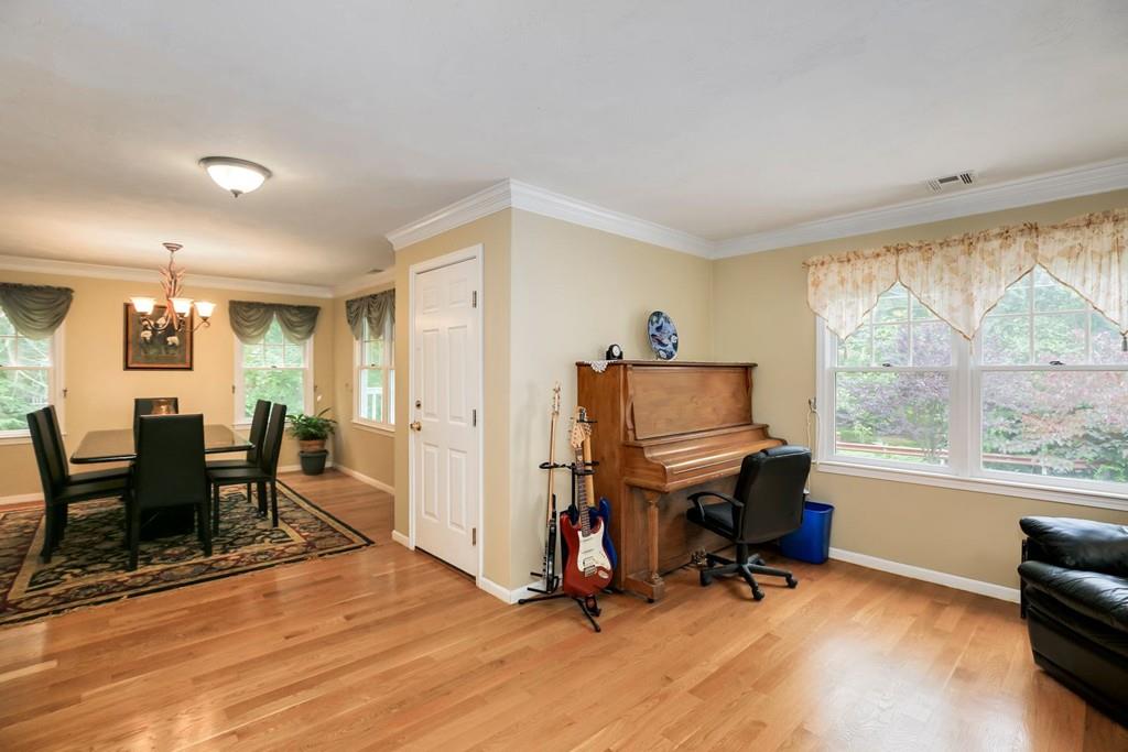 7 Cedar Brook Road Wellesley, MA 02482 - Photo 9 of 36 a view of a workspace with furniture and a window