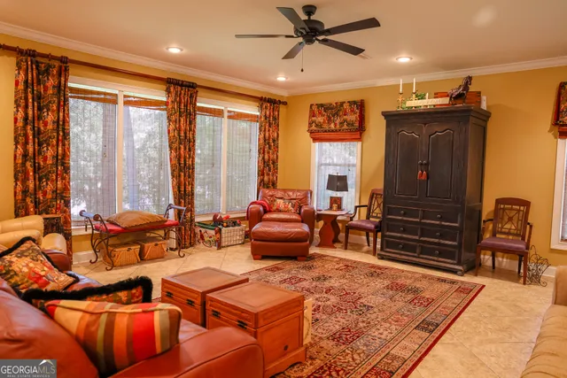 a living room with furniture and a window