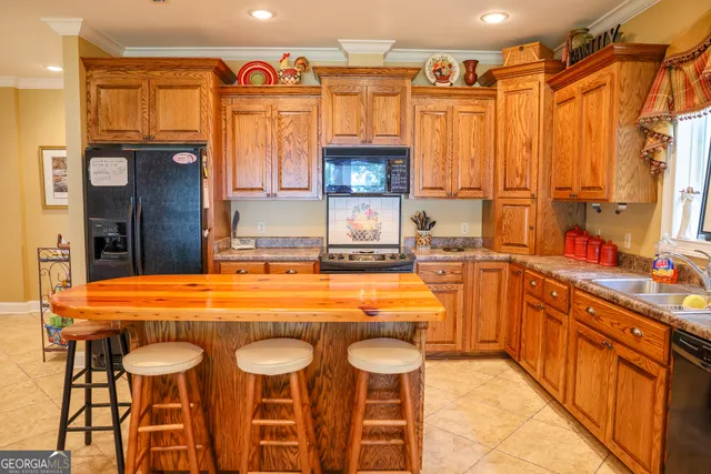 a view of a swimming pool with a table and chairs