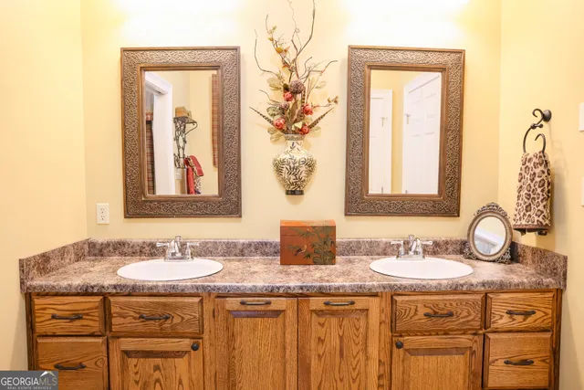 a bathroom with a toilet and a shower curtain