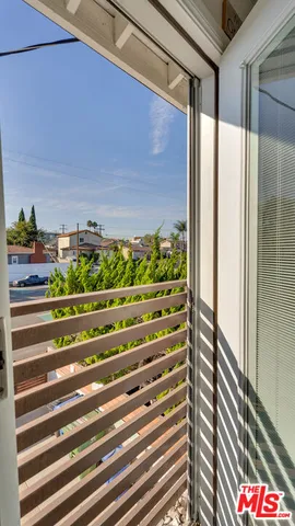a bathroom with a sink and a shower