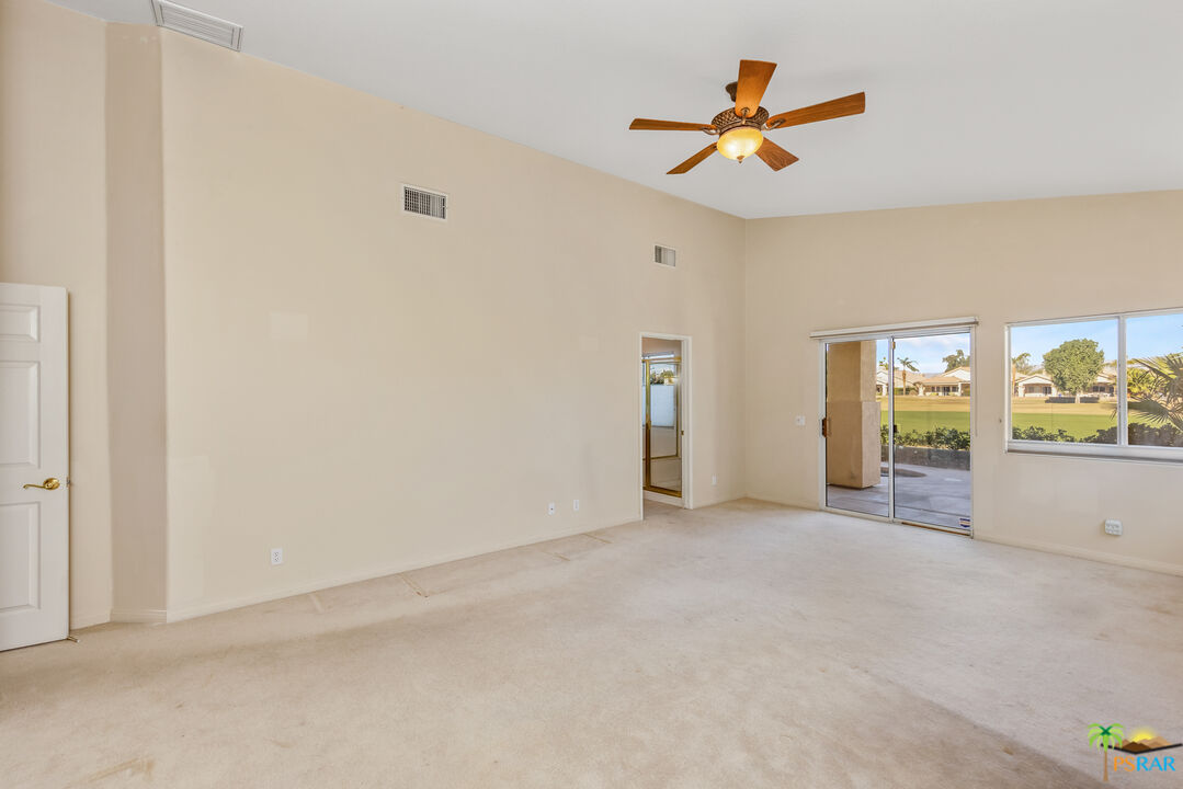 80372 Pebble Beach Drive Indio, CA 92201 - Photo 13 of 35 an empty room with closet and fan