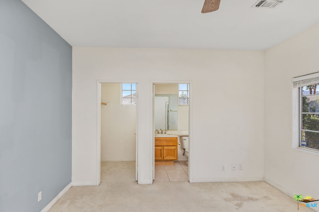 80372 Pebble Beach Drive Indio, CA 92201 - Photo 23 of 35 an empty room with windows