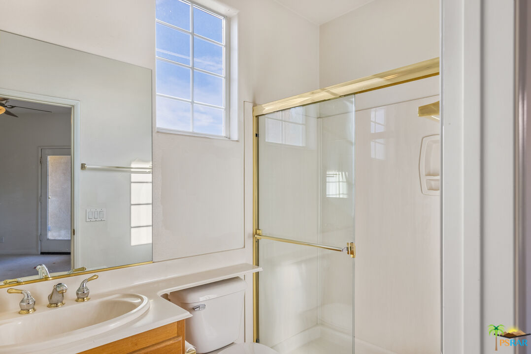 80372 Pebble Beach Drive Indio, CA 92201 - Photo 25 of 35 a bathroom with a sink and a mirror