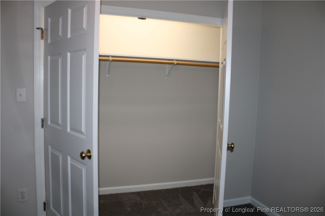 573 Porter Road Hope Mills, NC 28348 - Photo 22 of 29 a bathroom with a glass shower door