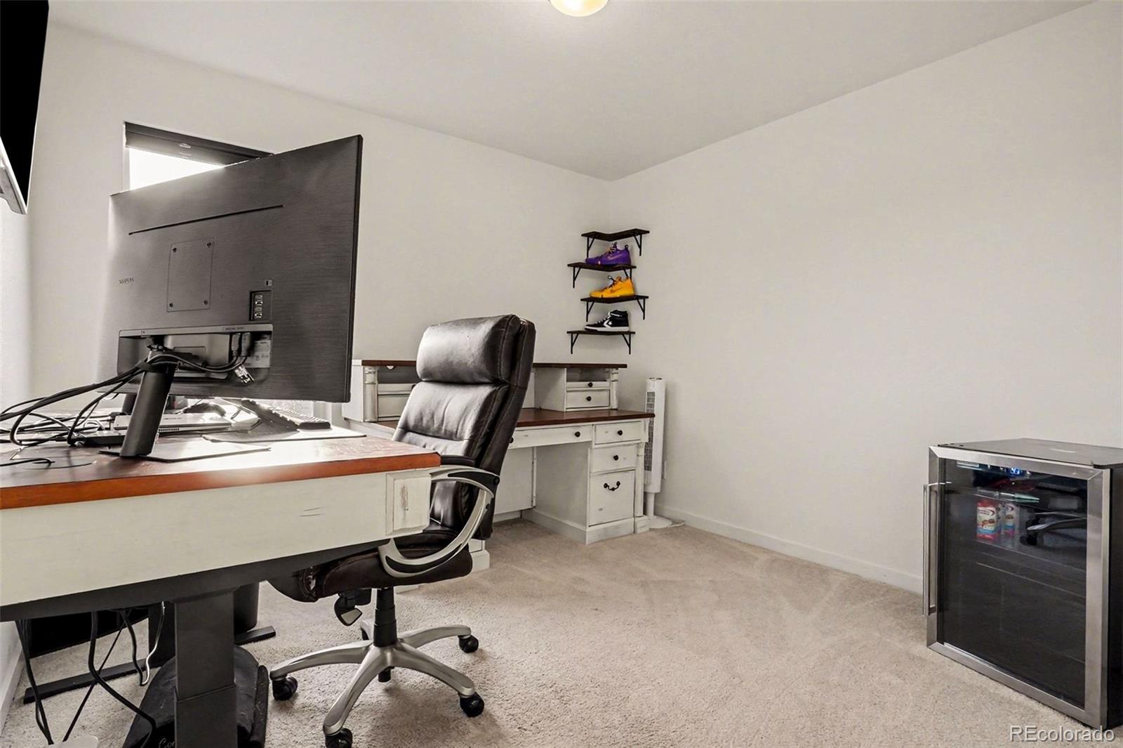 1053 Highpoint Trail Elizabeth, CO 80107 - Photo 18 of 28 a view of a workspace with furniture