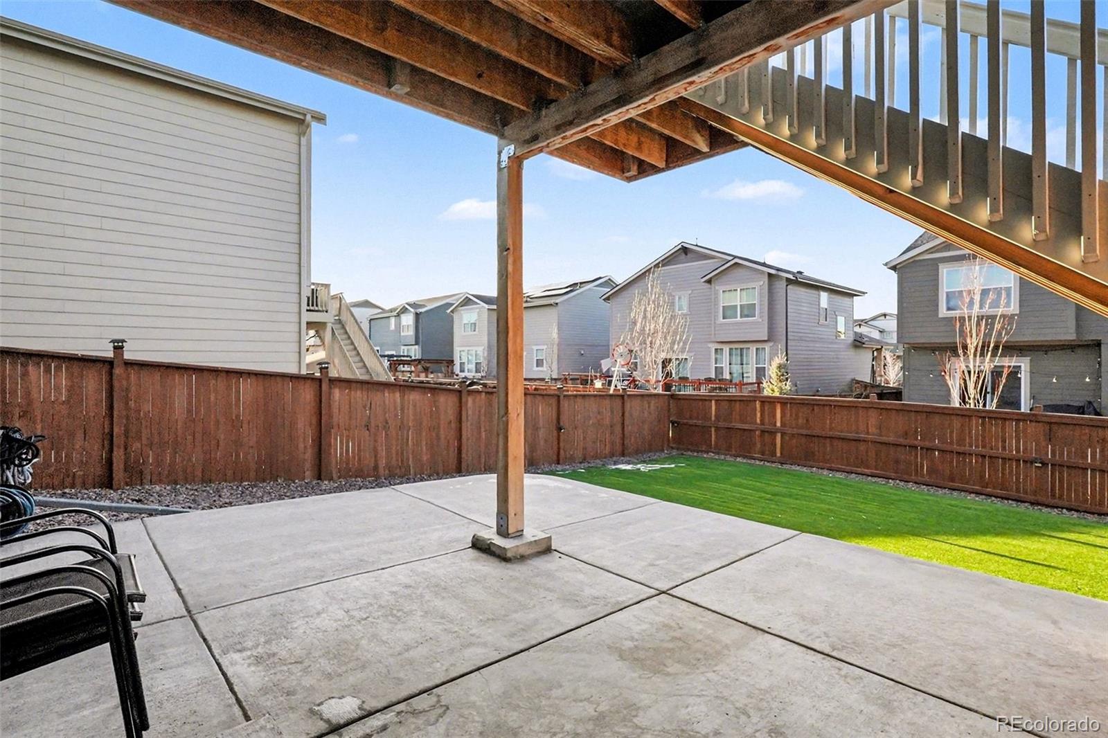 1053 Highpoint Trail Elizabeth, CO 80107 - Photo 23 of 28 a front view of a house with a garden