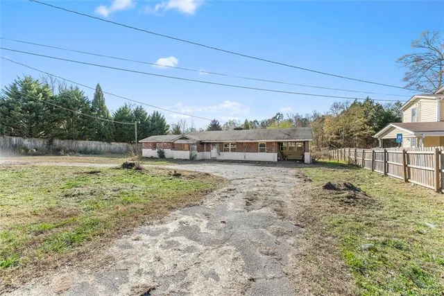 a view of a yard with an outdoor space