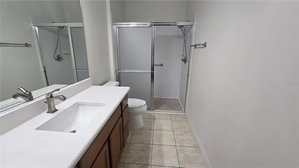 a view of storage and utility room with washer and dryer