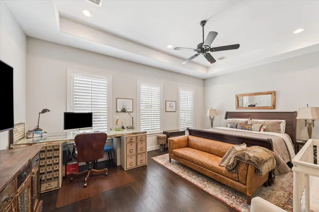 a view of a livingroom with workspace and a couch
