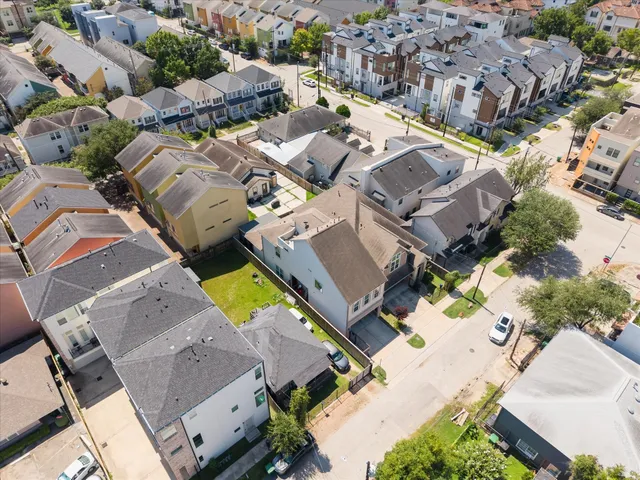 an aerial view of residential house with swimming pool