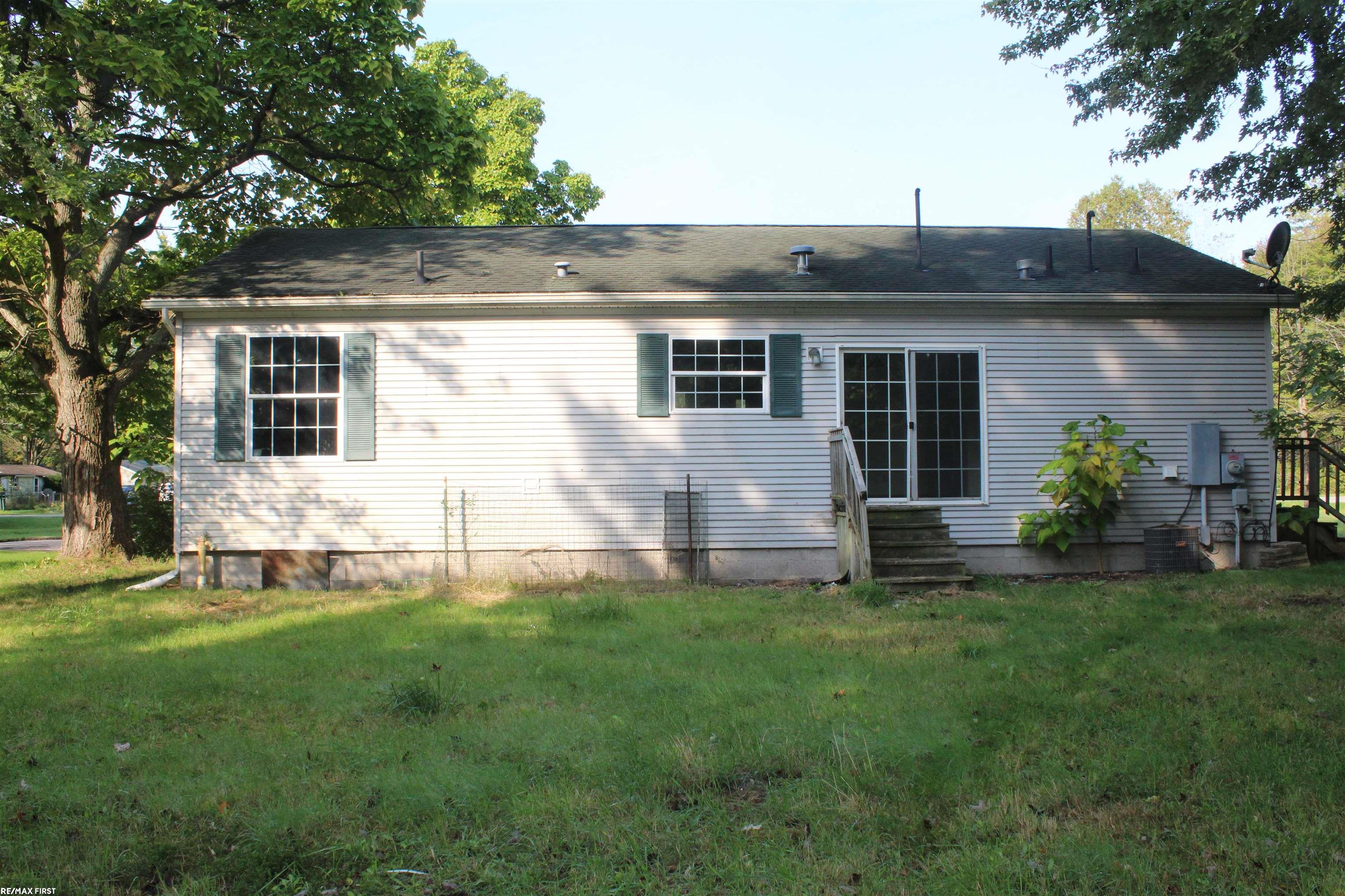 1790 Maple Road Smiths Creek, MI 48074 - Photo 4 of 20 50157658-957c983c-5c02-43d4-ba3e-bd1539e7b80d.JPG