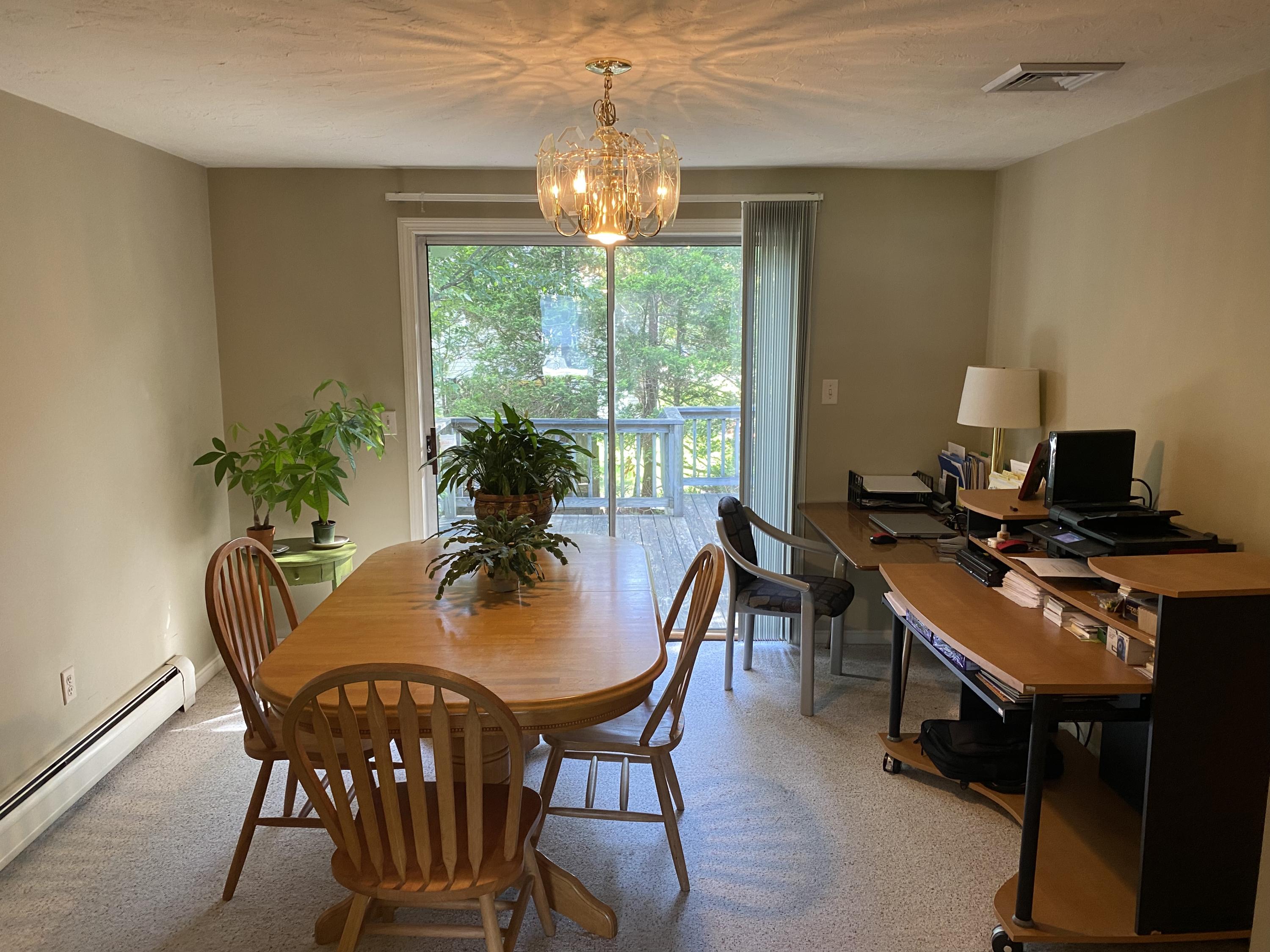 331 Ames Way Centerville, MA 02632 - Photo 5 of 16 a view of a dining room with furniture window and outside view
