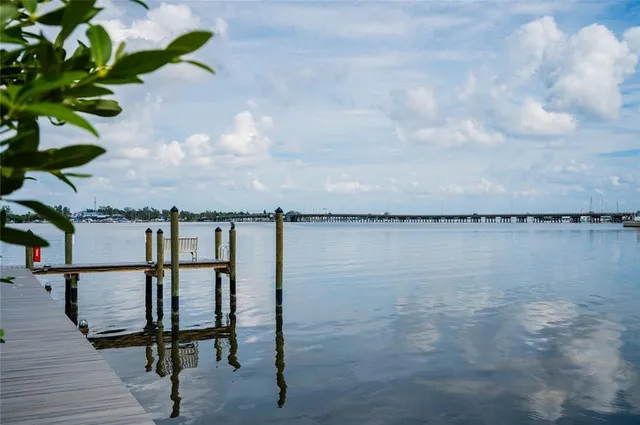 a view of a terrace with wooden benches