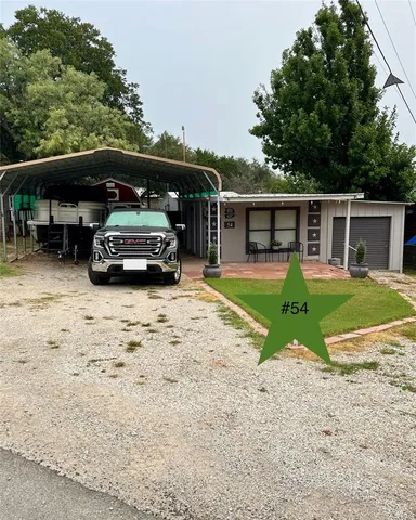 a view of car parked in front of house