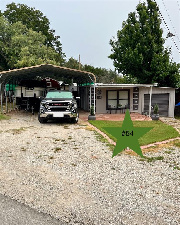 a view of car parked in front of house