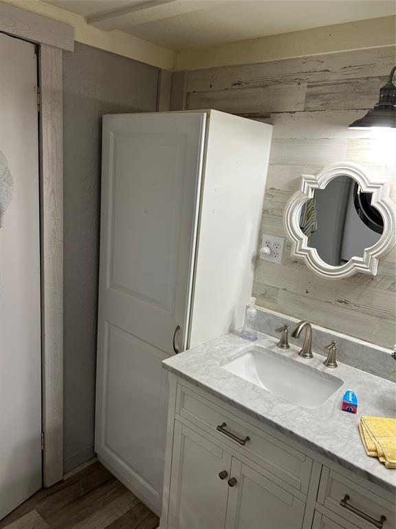 2334 San Bar Road, Unit 54 Graford, TX 76449 - Photo 11 of 28 a bathroom with a sink and a mirror