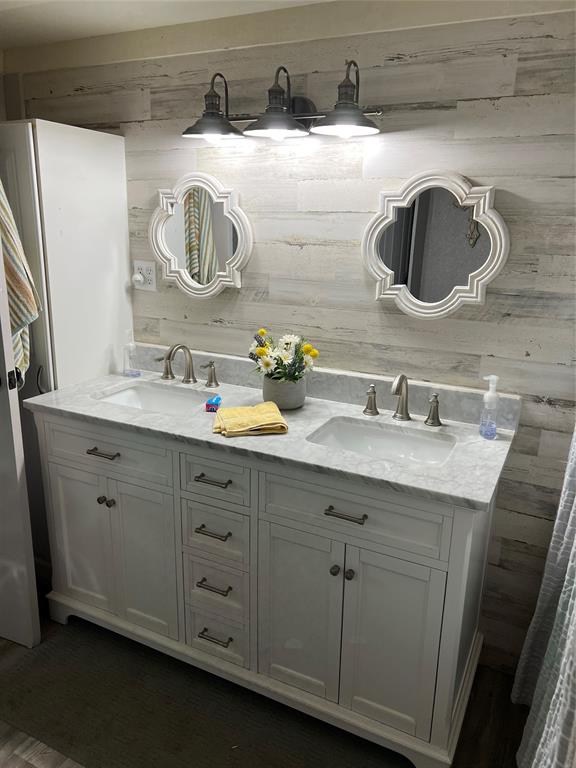 2334 San Bar Road, Unit 54 Graford, TX 76449 - Photo 12 of 28 a bathroom with a sink and a mirror
