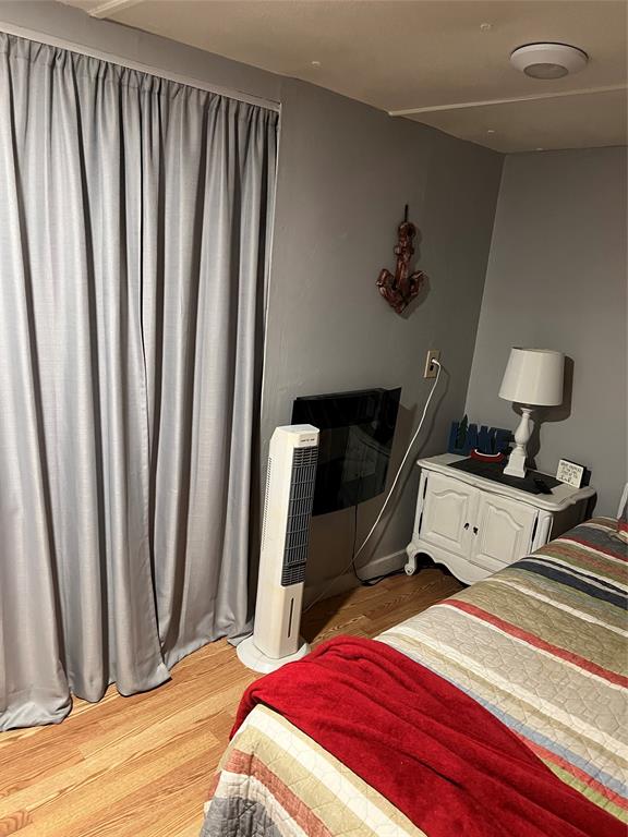 2334 San Bar Road, Unit 54 Graford, TX 76449 - Photo 15 of 28 a bedroom with a bed and a window