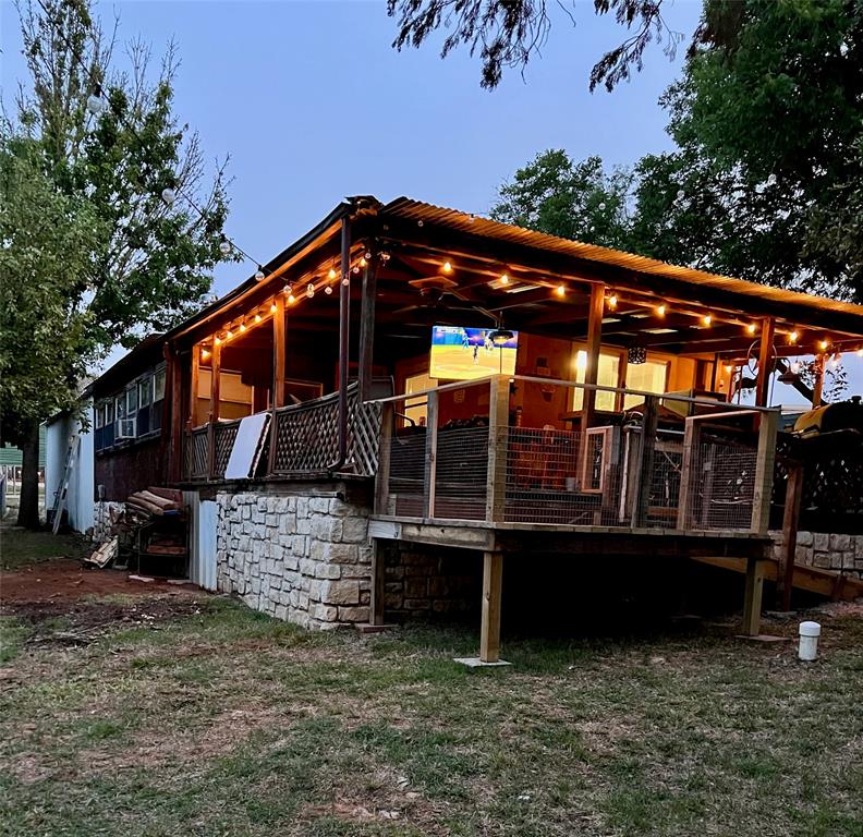 2334 San Bar Road, Unit 54 Graford, TX 76449 - Photo 2 of 28 a view of a house with a yard