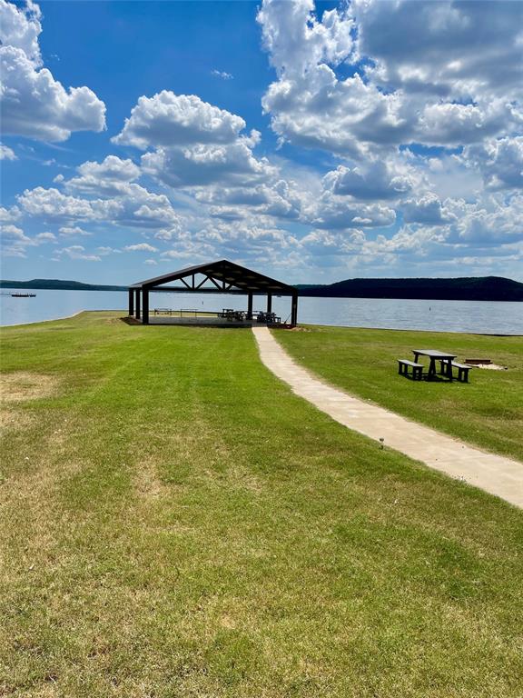 2334 San Bar Road, Unit 54 Graford, TX 76449 - Photo 25 of 28 a view of an ocean beach and residential houses