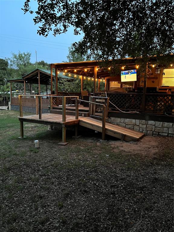 2334 San Bar Road, Unit 54 Graford, TX 76449 - Photo 3 of 28 a view of outdoor space with garden and seating