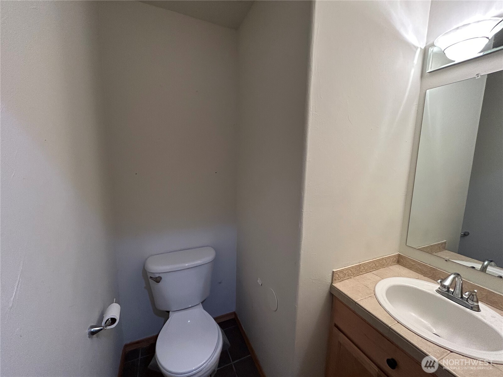 31114 29th Court Southwest Federal Way, WA 98023 - Photo 17 of 40 a bathroom with a sink toilet and a mirror