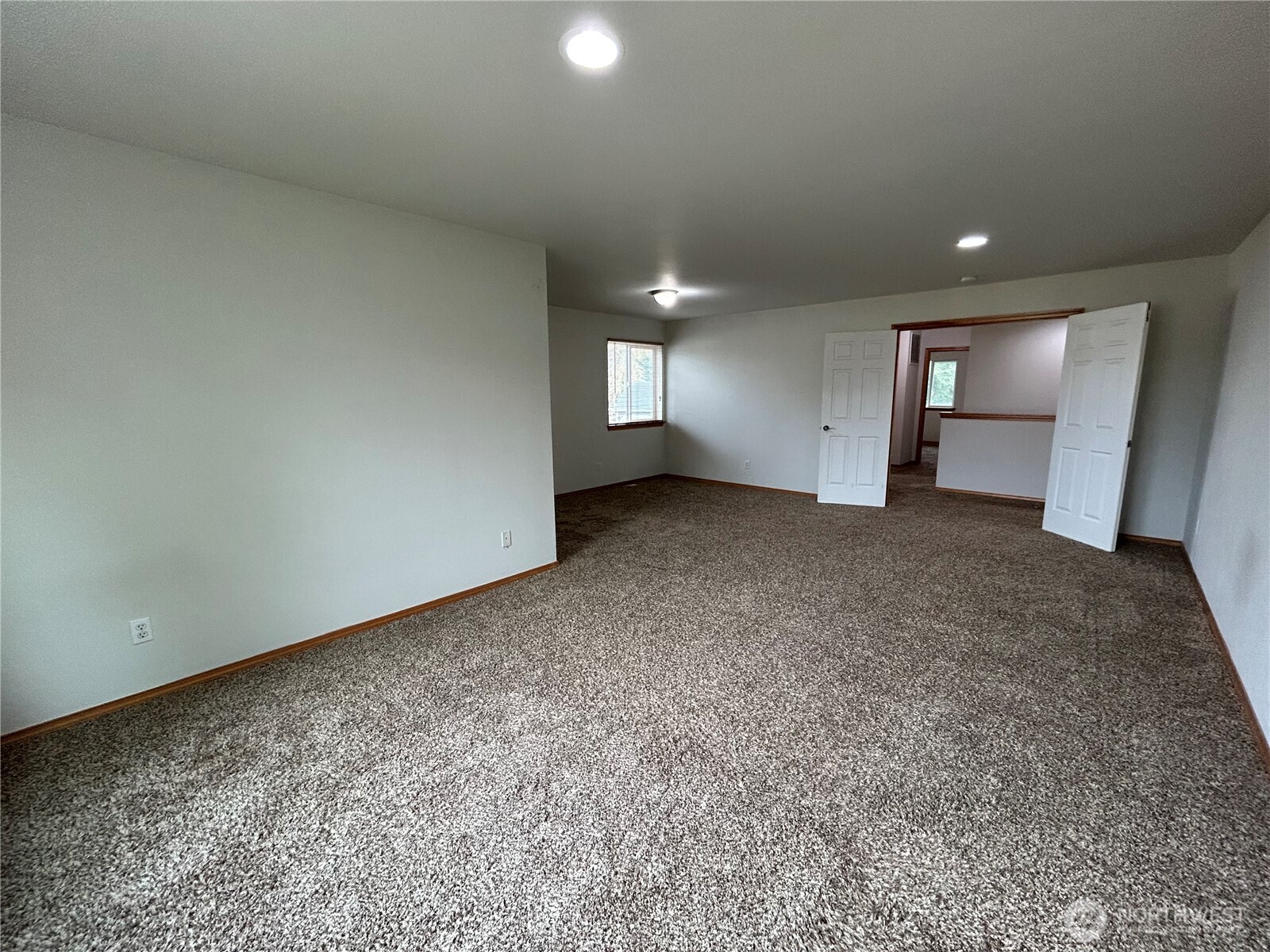 31114 29th Court Southwest Federal Way, WA 98023 - Photo 21 of 40 an empty room with a fireplace and painted walls