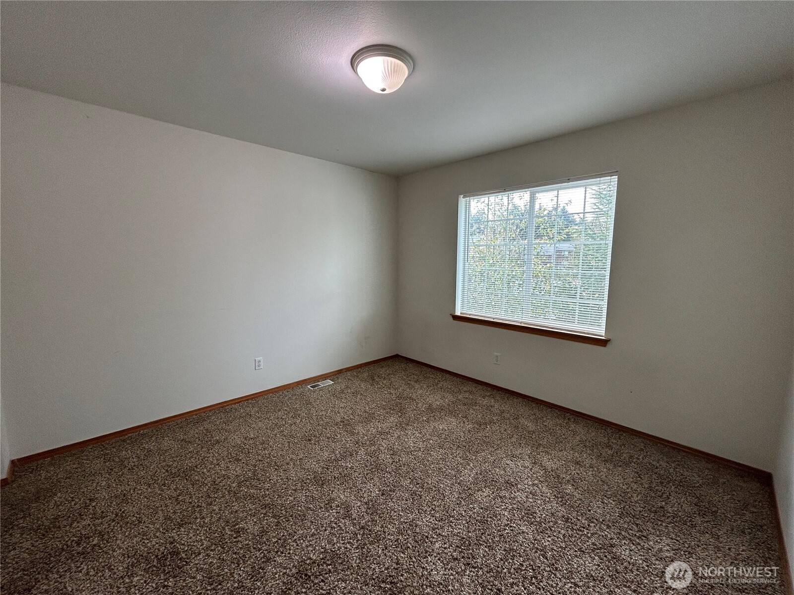 31114 29th Court Southwest Federal Way, WA 98023 - Photo 33 of 40 an empty room with a window