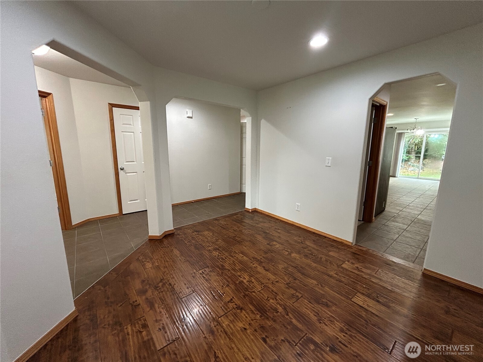 31114 29th Court Southwest Federal Way, WA 98023 - Photo 7 of 40 an empty room with wooden floor and entrance