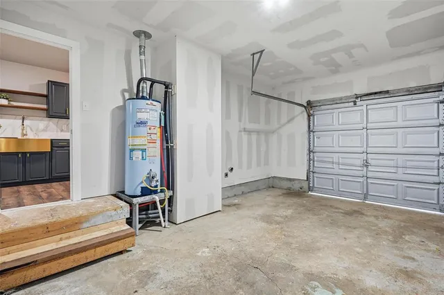 a bedroom with a bed and a flat tv screen