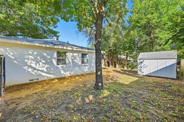 a view of a yard with an outdoor space