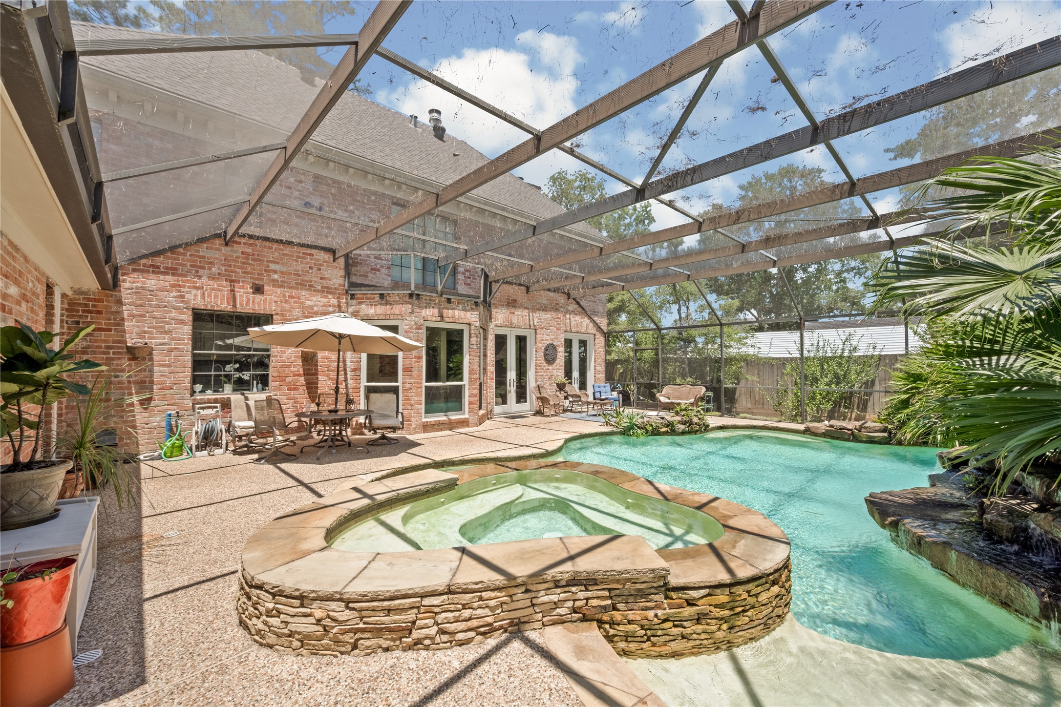 7639 Post Bridge Road Spring, TX 77389 - Photo 37 of 42 a view of a swimming pool with a patio