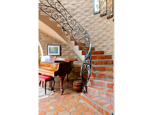 8 Mentone Road Carmel Highlands, CA 93923 - Photo 15 of 19 a room with furniture and a potted plant