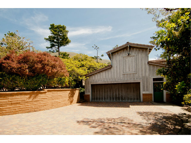8 Mentone Road Carmel Highlands, CA 93923 - Photo 19 of 19 a view of a house with a yard