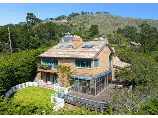 8 Mentone Road Carmel Highlands, CA 93923 - Photo 3 of 19 an aerial view of a house with a yard