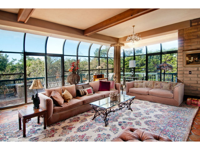 8 Mentone Road Carmel Highlands, CA 93923 - Photo 9 of 19 a living room with furniture and a large window