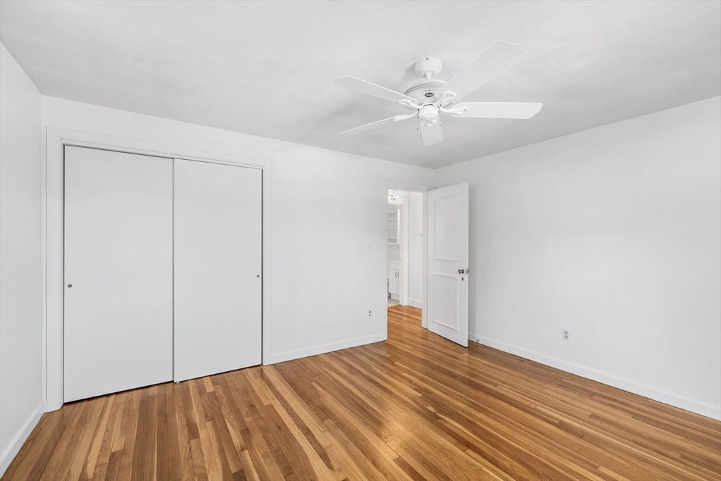 30 Haley Road, Unit 1 Marblehead, MA 01945 - Photo 11 of 21 a view of a room with wooden floor and fan