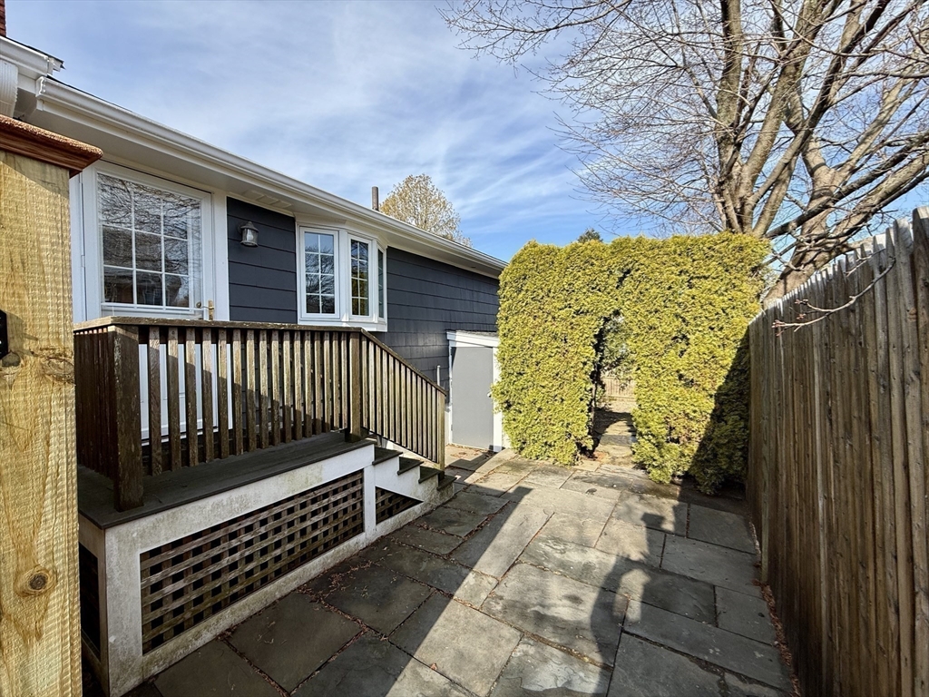 30 Haley Road, Unit 1 Marblehead, MA 01945 - Photo 18 of 21 a view of stairs and a garden