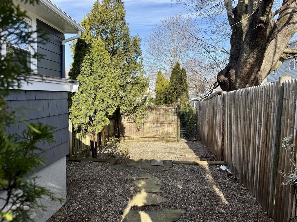 30 Haley Road, Unit 1 Marblehead, MA 01945 - Photo 20 of 21 a view of a pathway with flower garden